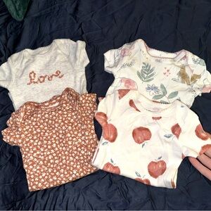 Four short sleeve onsies